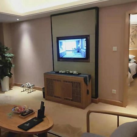 เฟยเชง บลอสซัม โอเต็ล Hotel Feicheng ภายนอก รูปภาพ