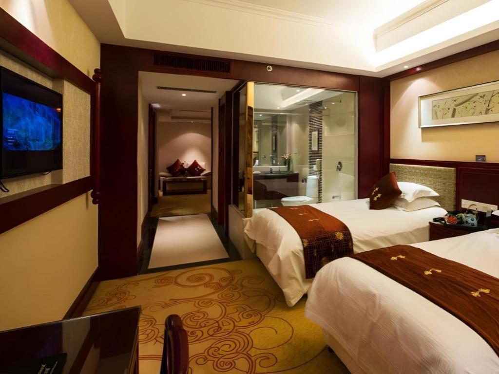 เฟยเชง บลอสซัม โอเต็ล Hotel Feicheng ภายนอก รูปภาพ