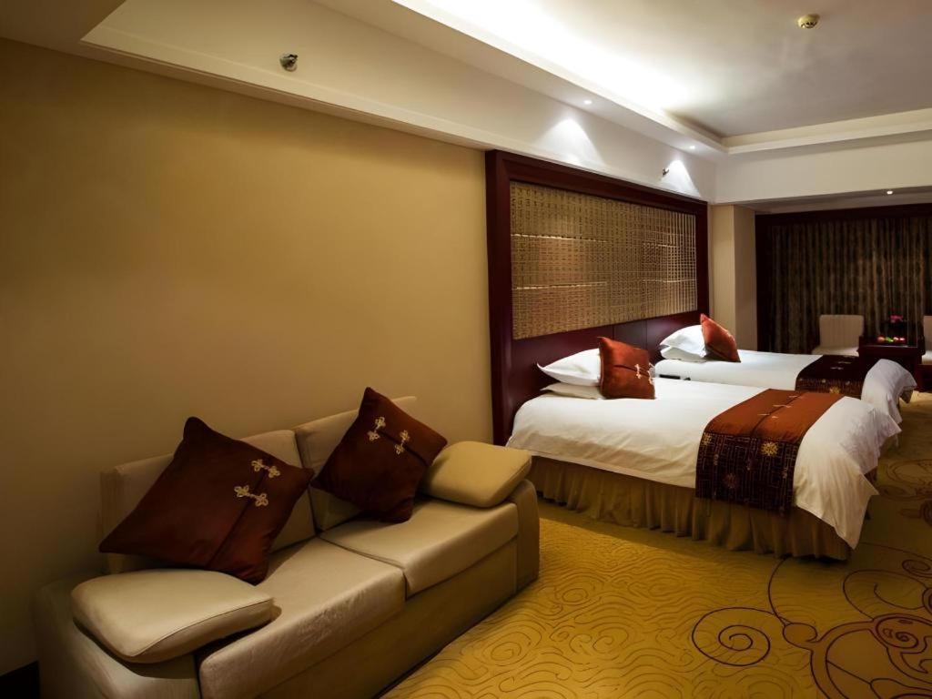 เฟยเชง บลอสซัม โอเต็ล Hotel Feicheng ภายนอก รูปภาพ