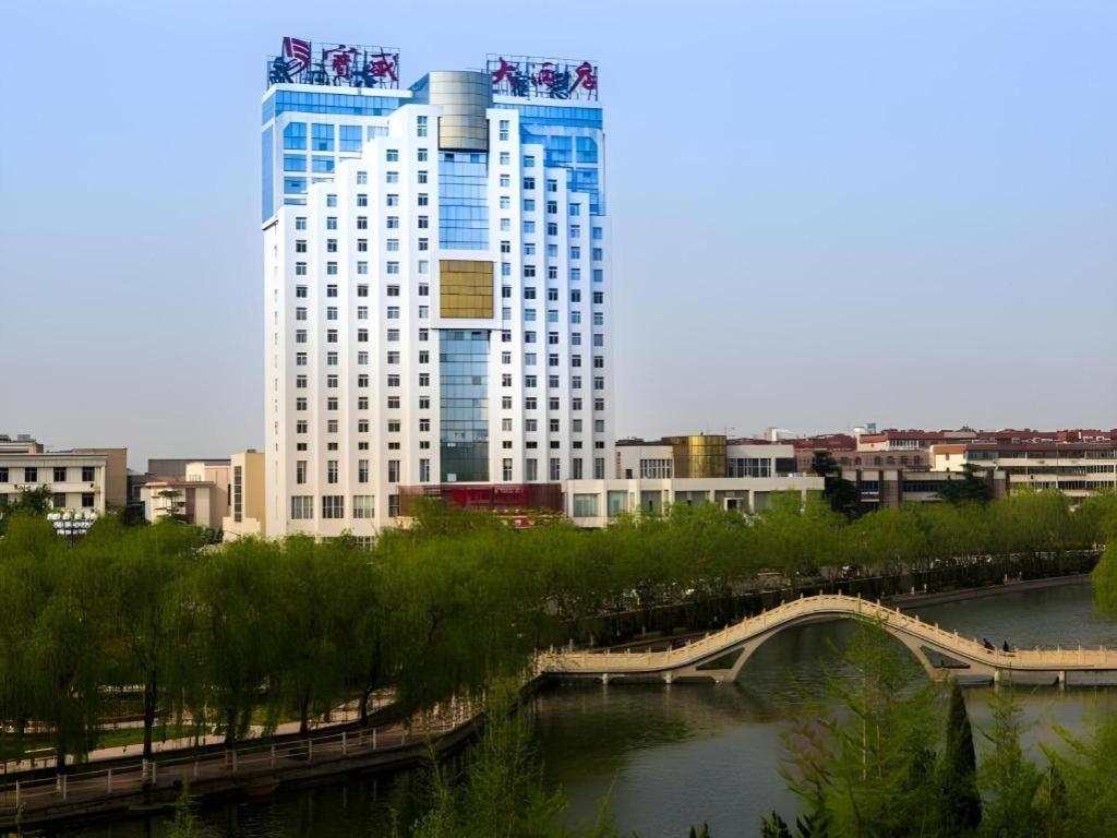 เฟยเชง บลอสซัม โอเต็ล Hotel Feicheng ภายนอก รูปภาพ