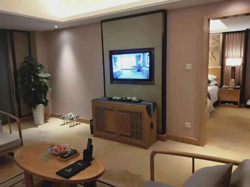 เฟยเชง บลอสซัม โอเต็ล Hotel Feicheng ภายนอก รูปภาพ