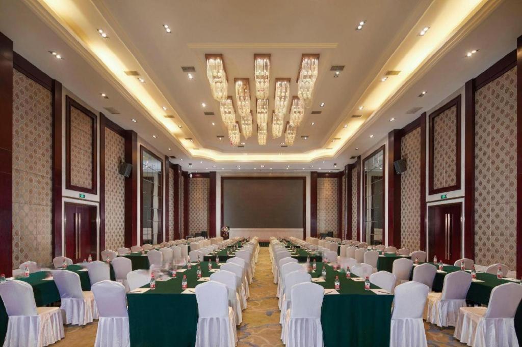 เฟยเชง บลอสซัม โอเต็ล Hotel Feicheng ภายนอก รูปภาพ