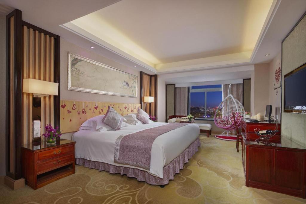 เฟยเชง บลอสซัม โอเต็ล Hotel Feicheng ภายนอก รูปภาพ