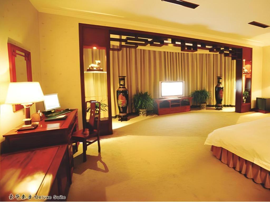 เฟยเชง บลอสซัม โอเต็ล Hotel Feicheng ภายนอก รูปภาพ