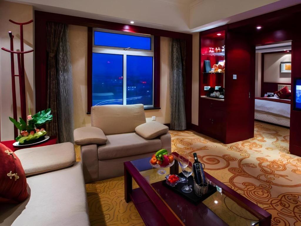 เฟยเชง บลอสซัม โอเต็ล Hotel Feicheng ภายนอก รูปภาพ
