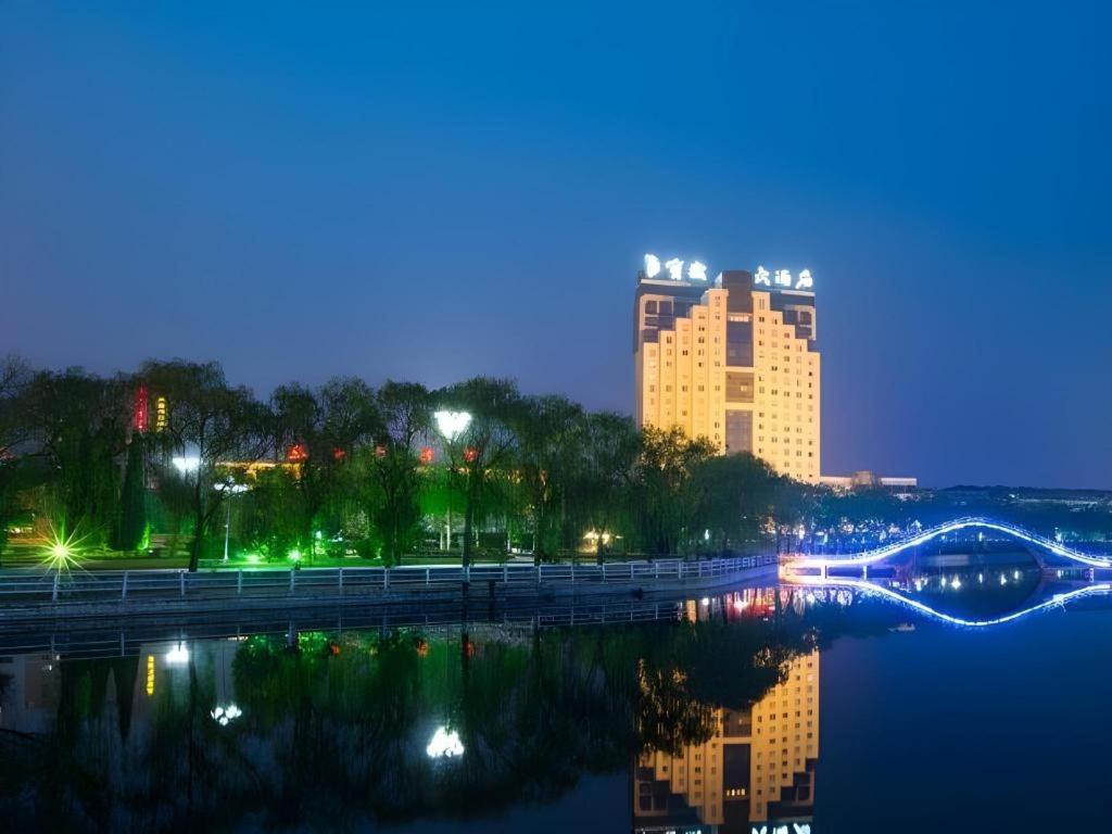 เฟยเชง บลอสซัม โอเต็ล Hotel Feicheng ภายนอก รูปภาพ