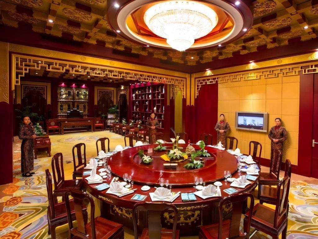 เฟยเชง บลอสซัม โอเต็ล Hotel Feicheng ภายนอก รูปภาพ