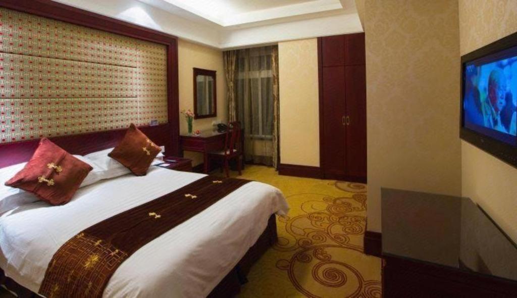 เฟยเชง บลอสซัม โอเต็ล Hotel Feicheng ภายนอก รูปภาพ