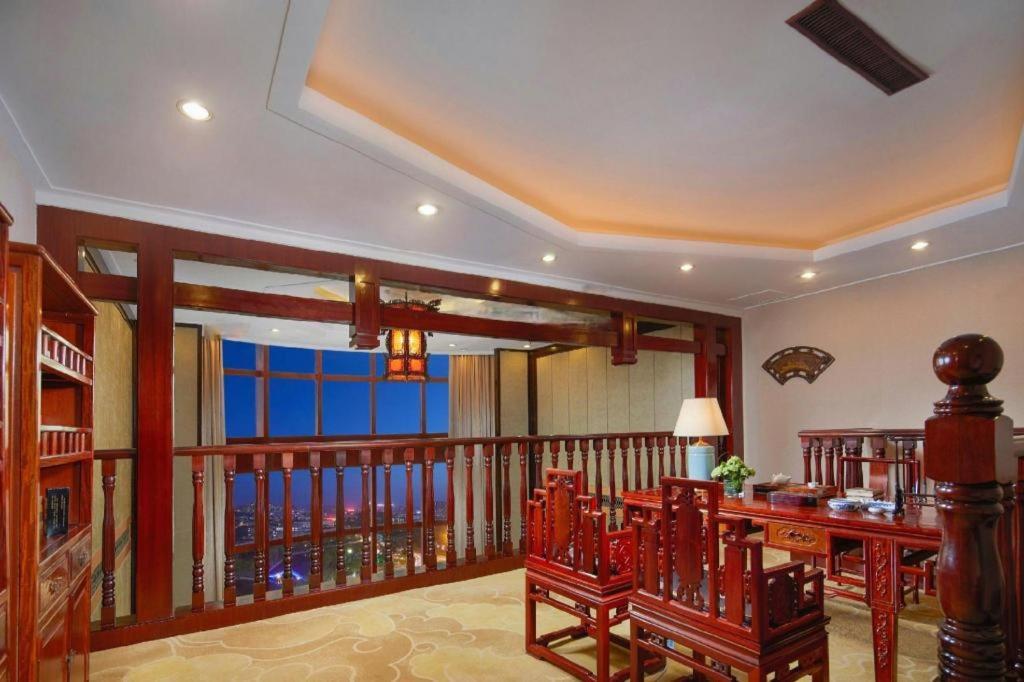 เฟยเชง บลอสซัม โอเต็ล Hotel Feicheng ภายนอก รูปภาพ