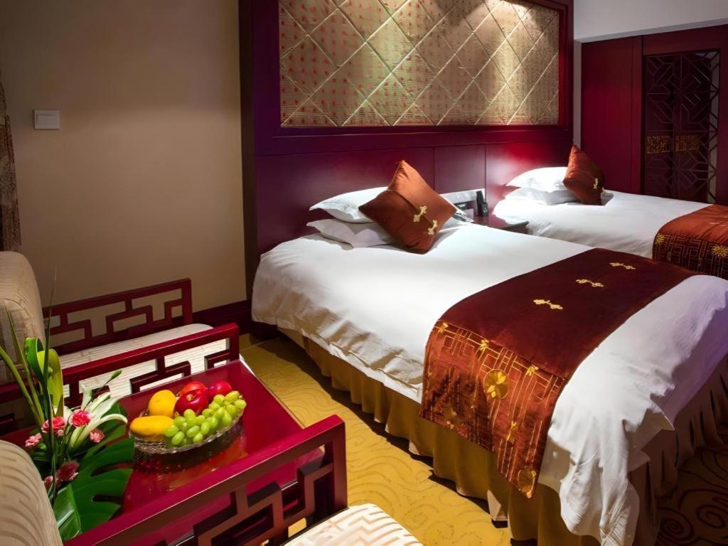 เฟยเชง บลอสซัม โอเต็ล Hotel Feicheng ภายนอก รูปภาพ