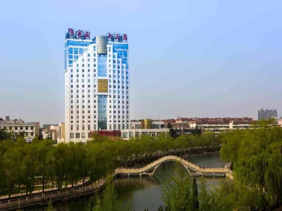 เฟยเชง บลอสซัม โอเต็ล Hotel Feicheng ภายนอก รูปภาพ